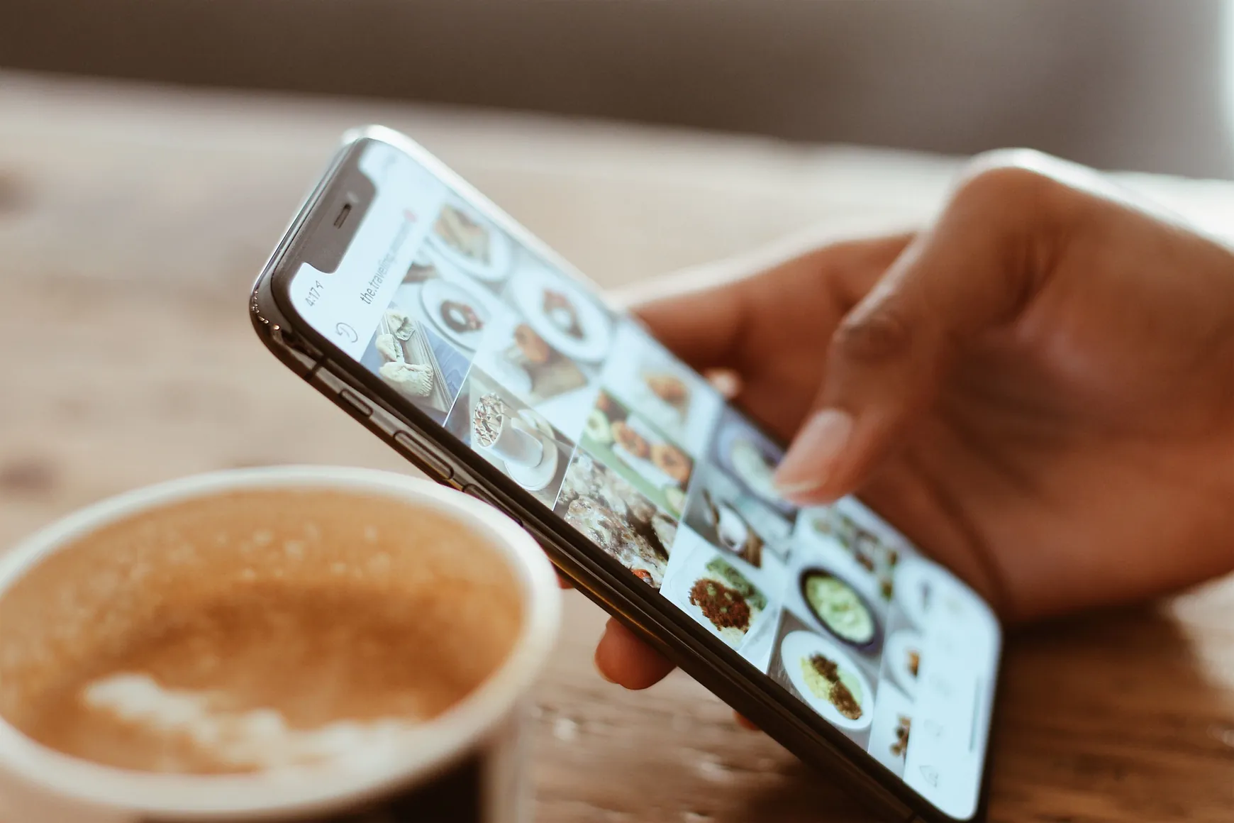 Instagram grid of artwork photos viewed on a smartphone