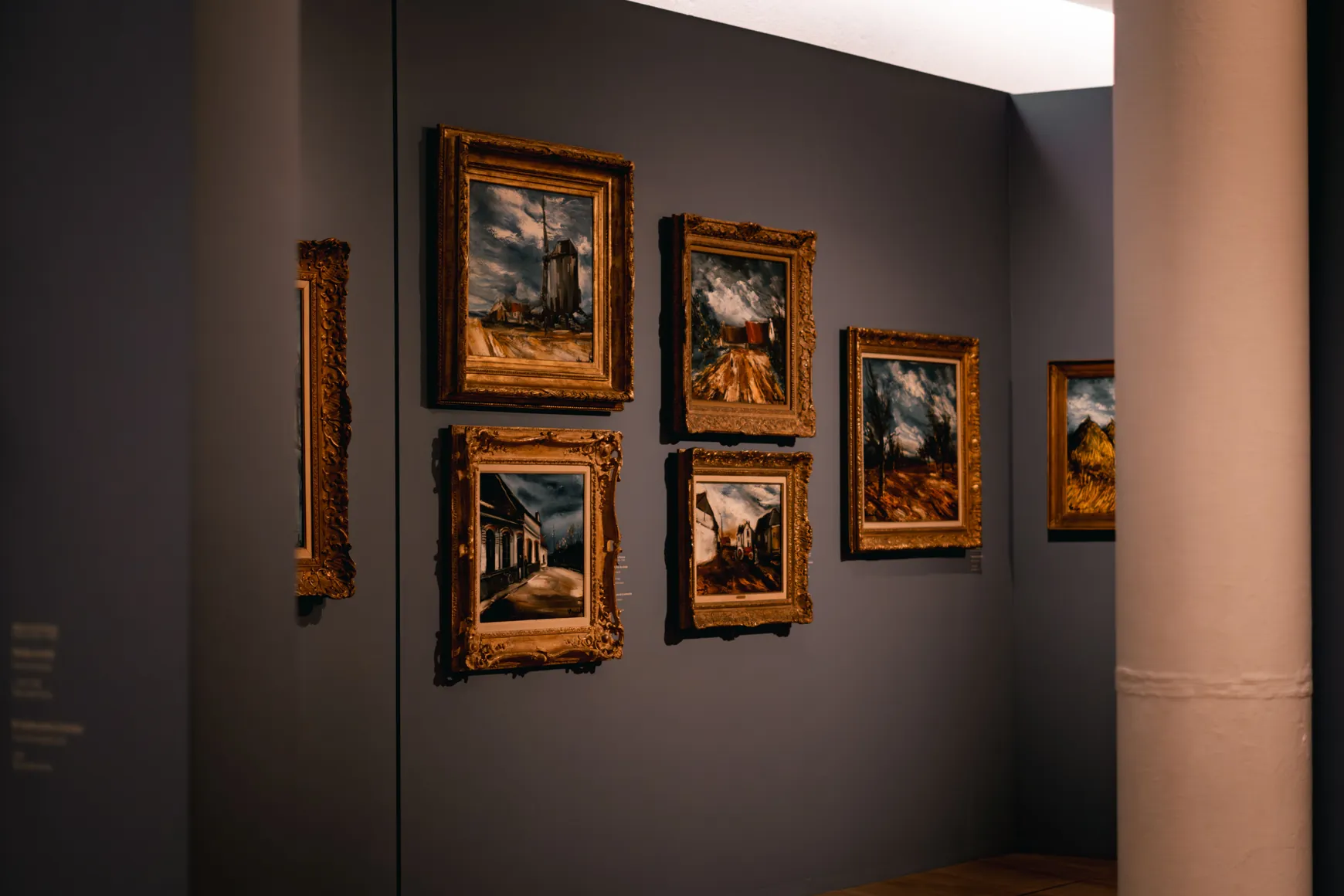 Empty physical art gallery representing the cost of renting exhibition space